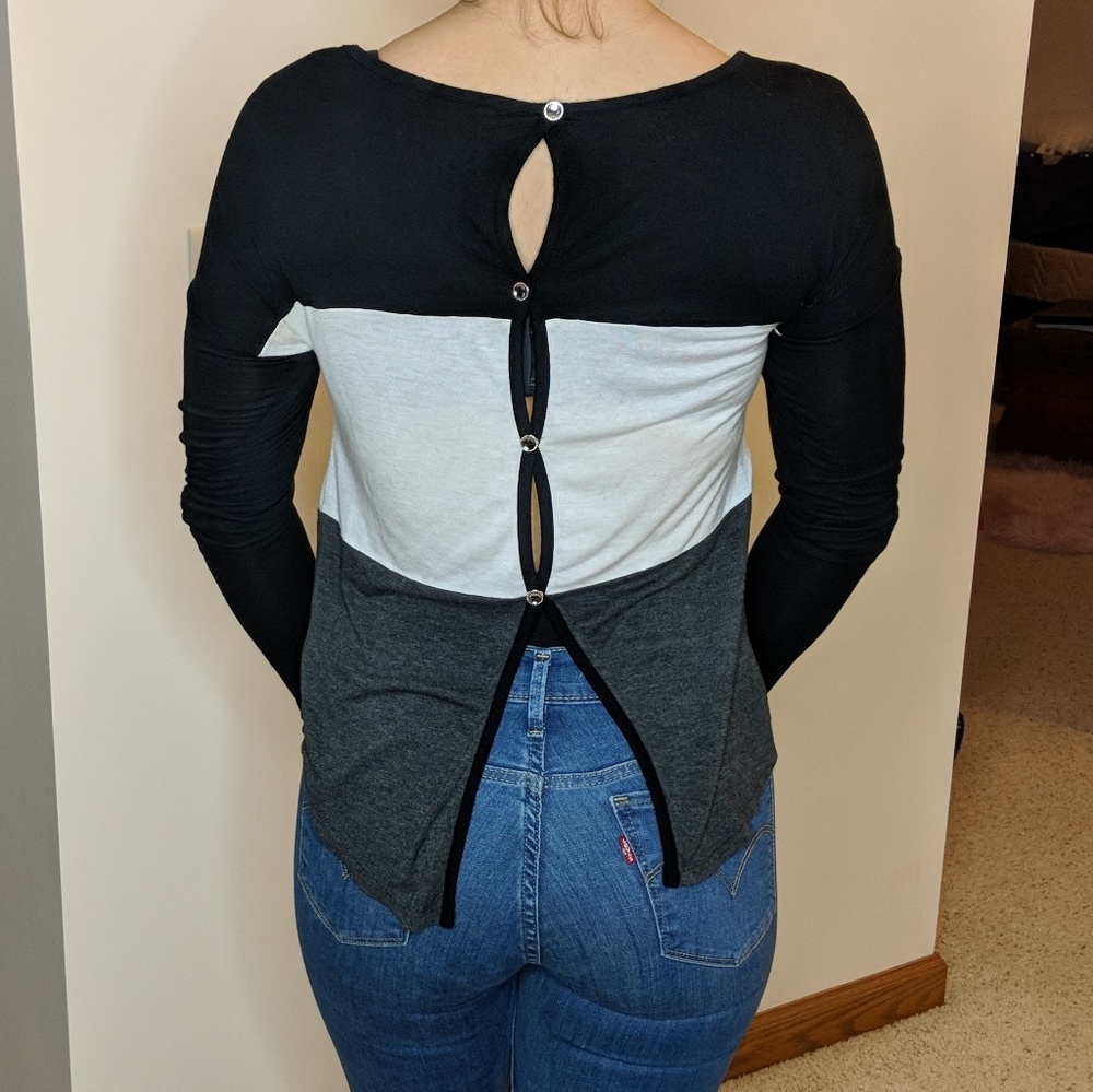Partially open back shirt